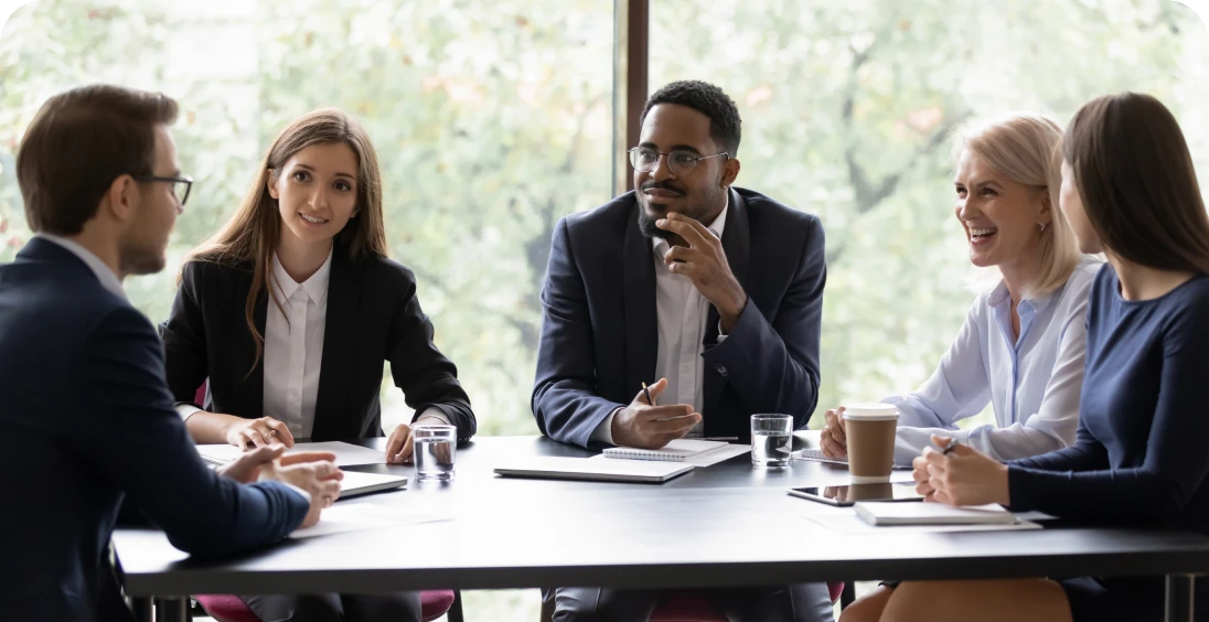 Team discussing ideas in a meeting room